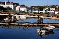 November 2000. <br>Portugal. Tavira. Brücke über den Fluss Gilhão. Motorboot. Fischerboot.