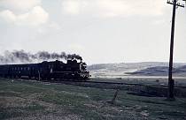 1960er. Rumanien. Romania. Strommast. Eisenbahn. Dampflok
